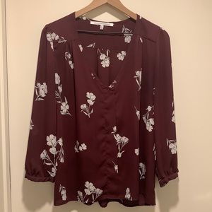 Burgundy with white flowers blouse. From Collective Concepts. Size L